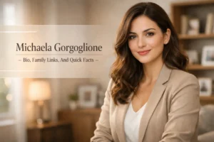 Professional portrait of Michaela Gorgoglione in a warm home office setting with soft natural light.